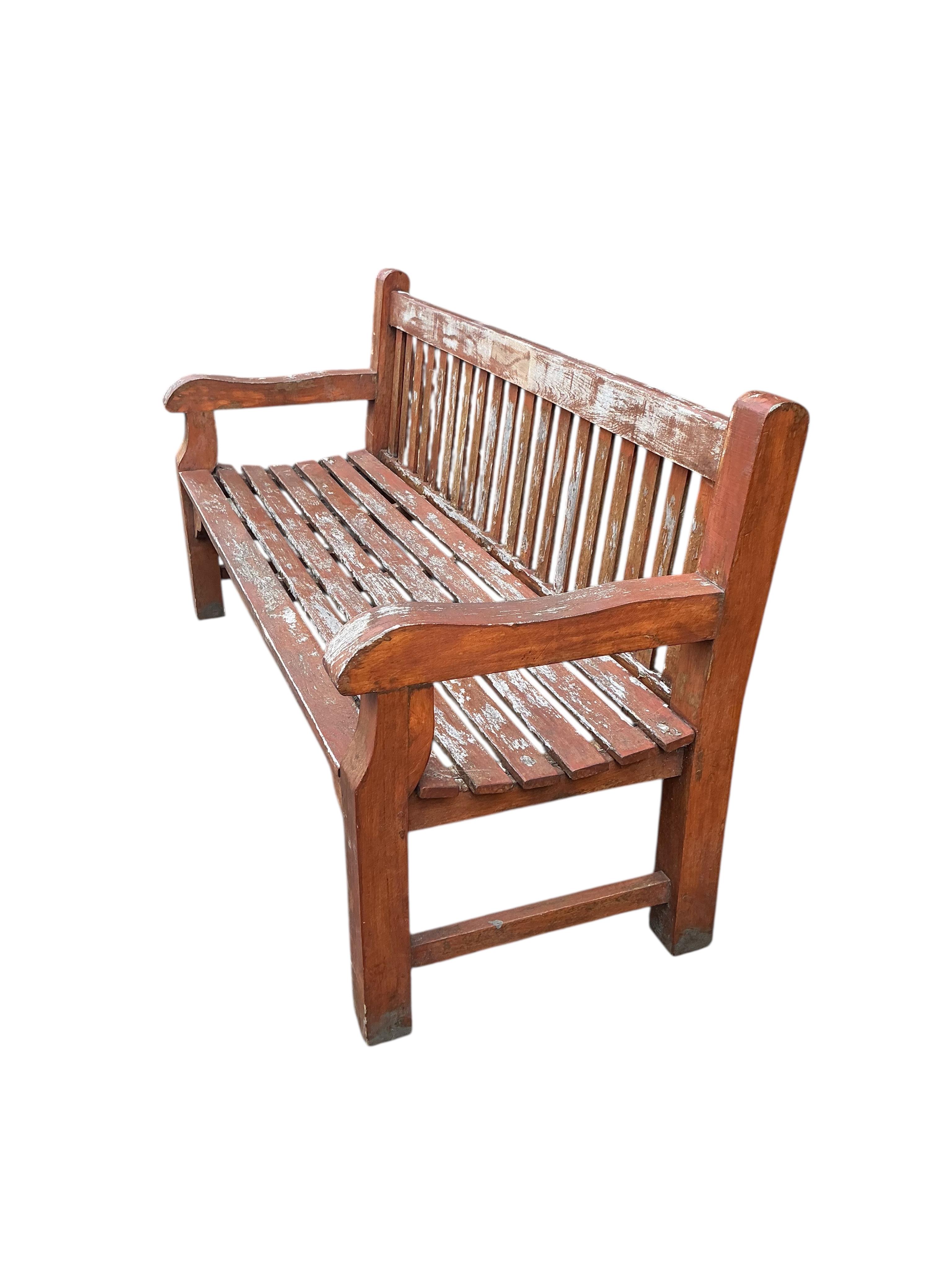 A Lindsey weathered stained teak garden bench, width 180cm, depth 66cm, height 94cm